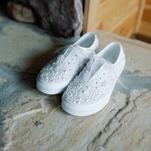 Pearled white vans size 7.